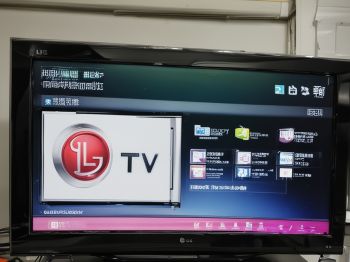 Before repair: LG TV with no power and dark screen